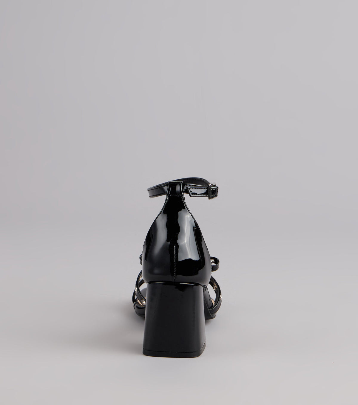 City Lights Bow Grommet Block Heels