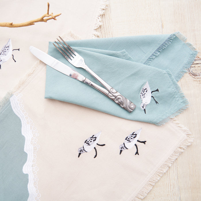 Sandpiper Sprint Table Linens table linens displayed as a coordinated tabletop setting.