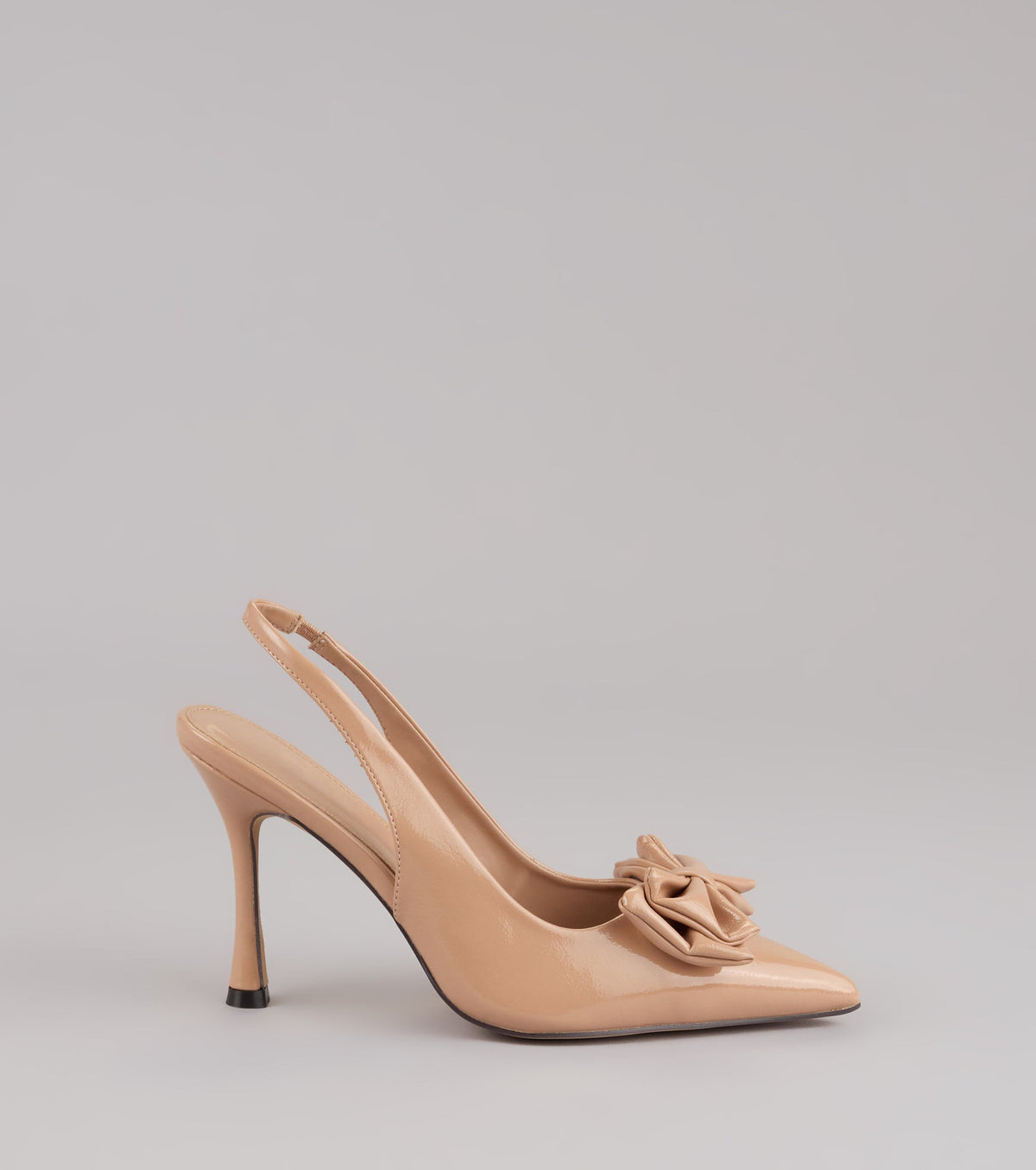 Strut Season Bow Stiletto Pumps