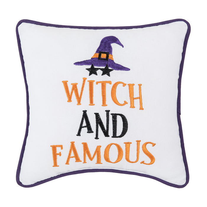 A 10in. x 10in. Witch And Famous Mini Pillow.
