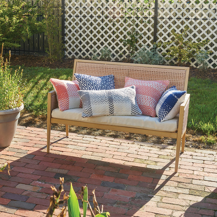 A 14in. x 22in. Sim Wave Outdoor Pillow.