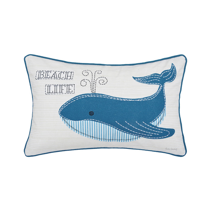 A 14in. x 22in. Whale Beach Life Pillow.