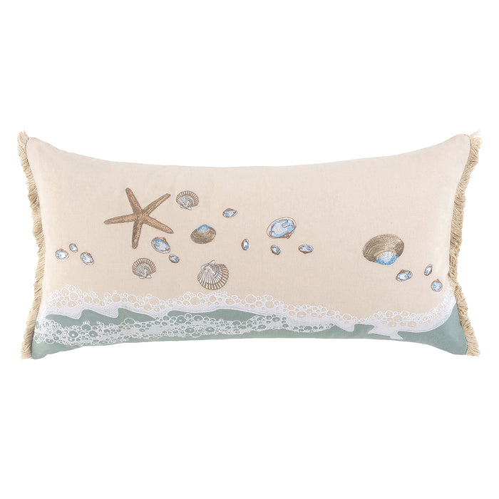 A 14in. x 24in. Sand & Shells Fringed Lumbar Indoor Pillow.