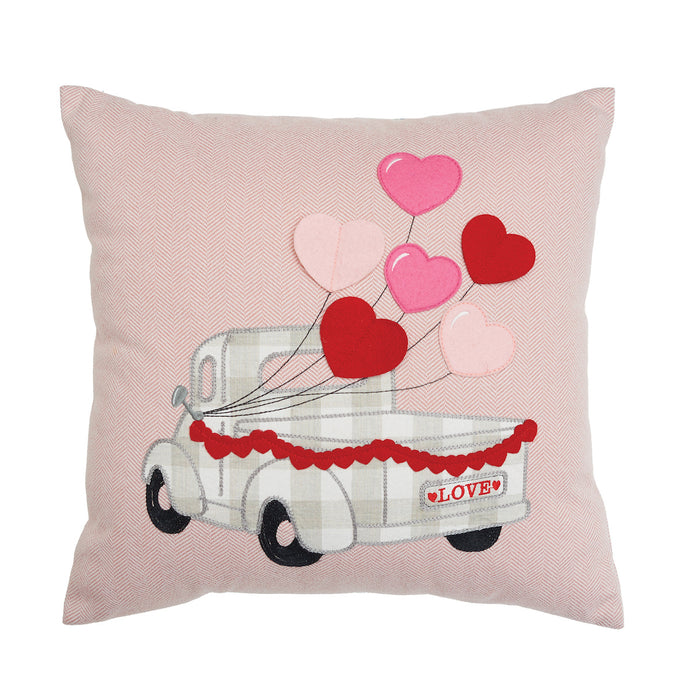 A 18in. x 18in. Hearts Truck Pillow.