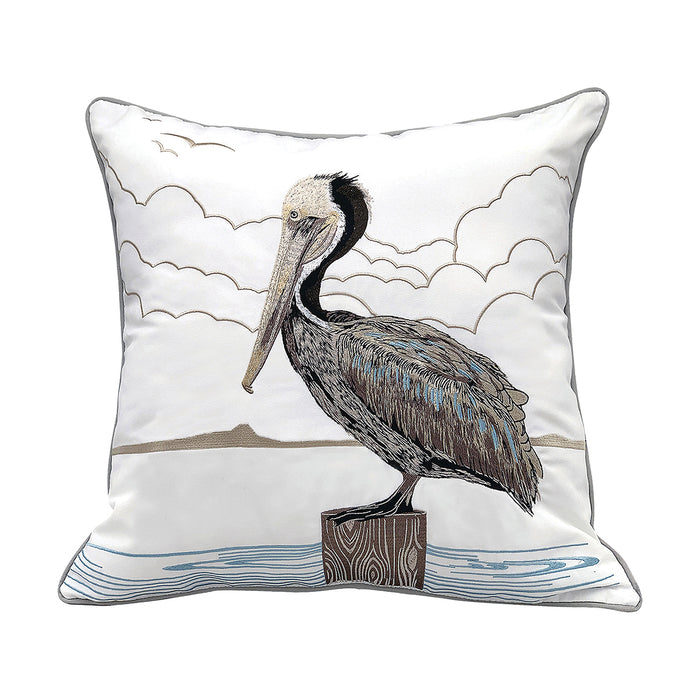 A 20in. x 20in. Sunbathing Brown Pelican Indoor Outdoor Pillow.