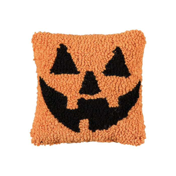 A 8in. x 8in. Jack-o-Lantern Hooked Mini Pillow.