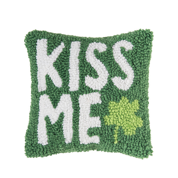 A 8in. x 8in. Kiss Me Clover Hooked Mini Pillow.
