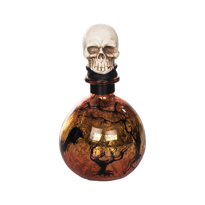 A Amber Glass Skull Bottle.