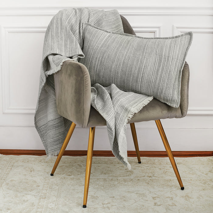 A Beacon Bed Throw displayed on a bed.