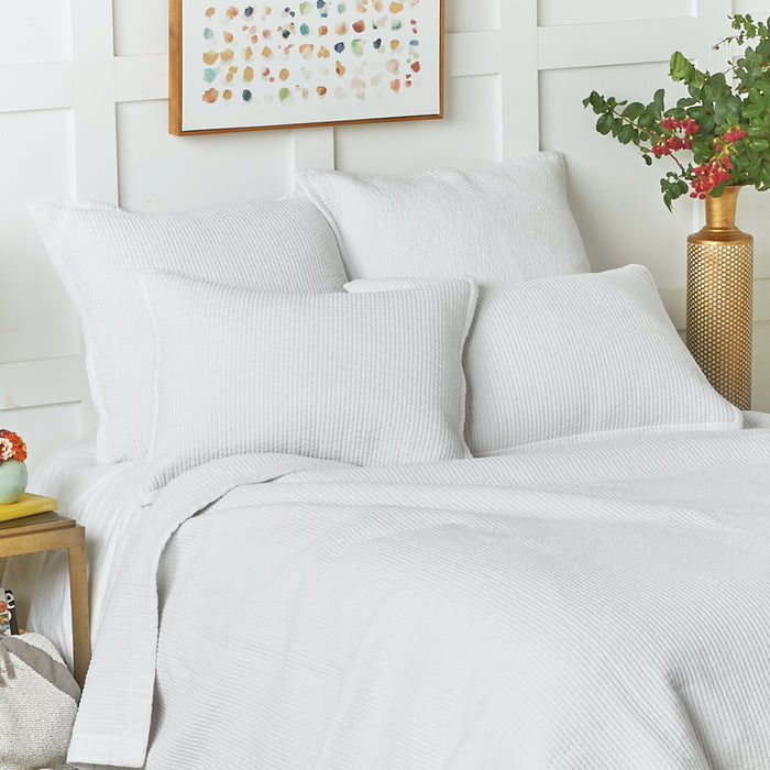 A bennett white quilt standard sham.