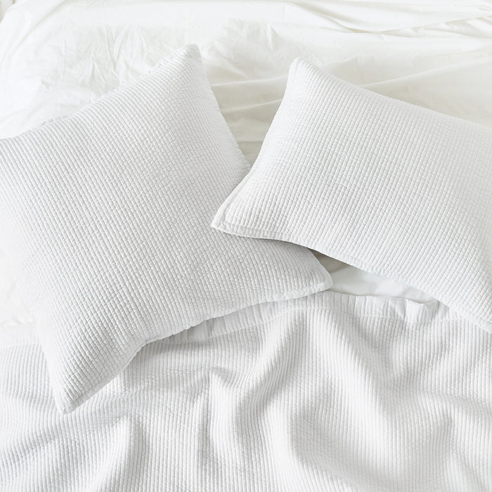 A bennett white quilt standard sham.