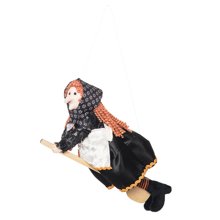 A Black & Orange Kitchen Witch Figurine.