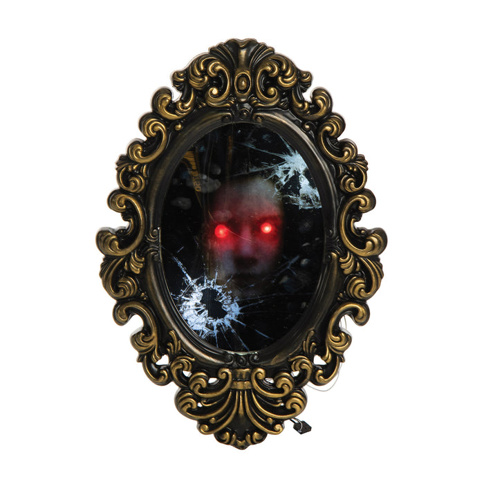 A Broken Mirror with Creepy Face.