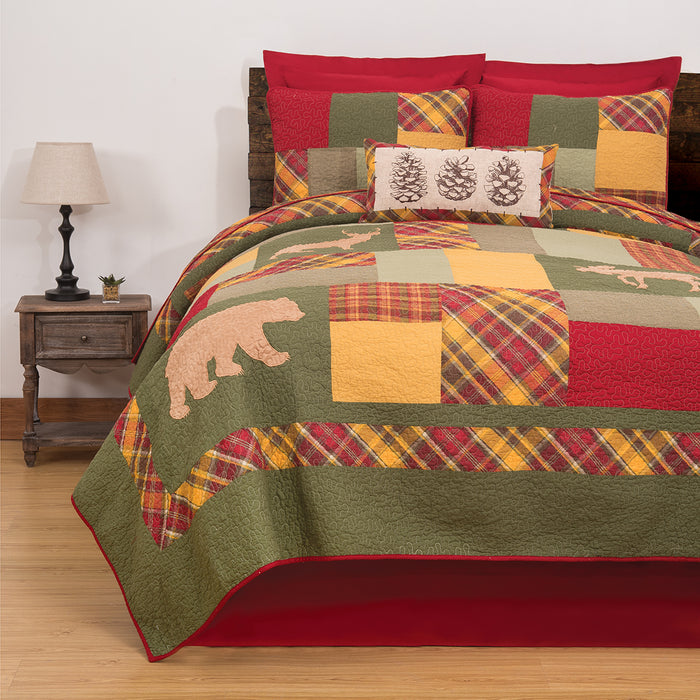 A Buckley Quilt Set displayed on a made bed.