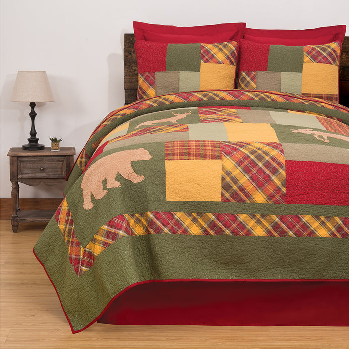 A Buckley Quilt Set displayed on a made bed.
