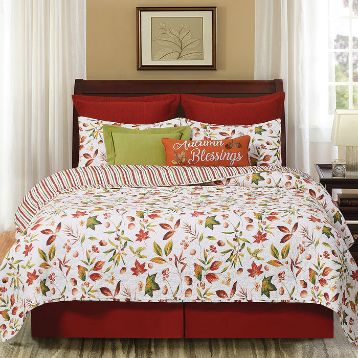 A Camilla Quilt Set displayed on a made bed.