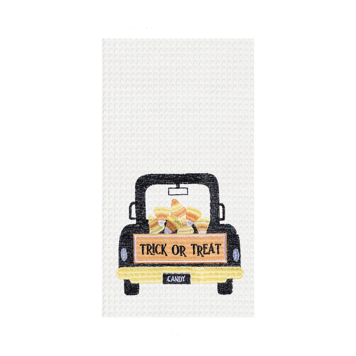 A Candy Corn Truck Waffle Weave Kitchen Towel.