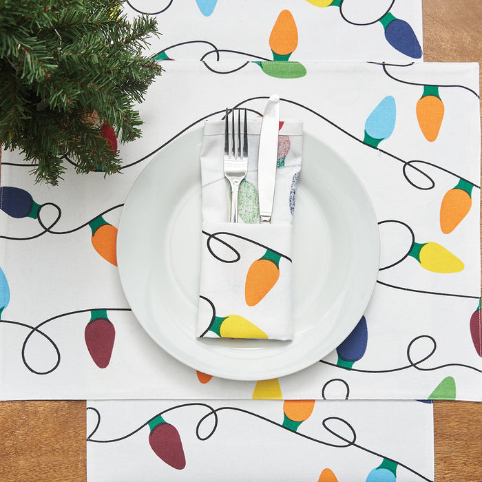 Christmas Light Table Linens table linens displayed as a coordinated tabletop setting.