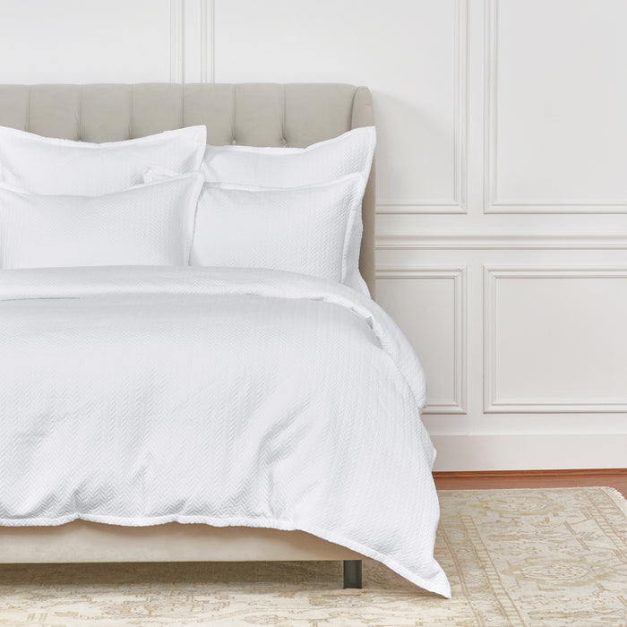 A Edin Duvet Cover displayed on a bed.