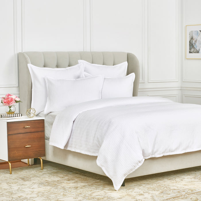 A Edin Duvet Cover displayed on a bed.