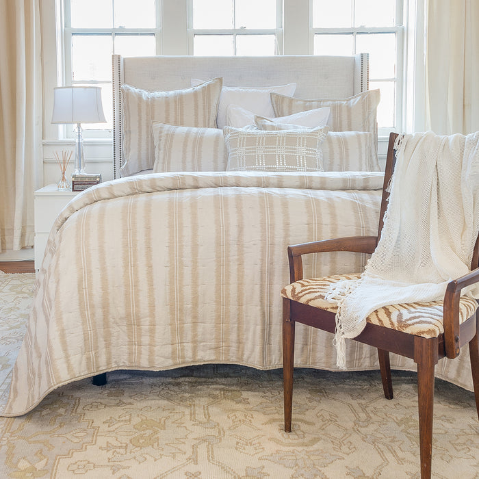 A Farren Quilt displayed on a made bed.