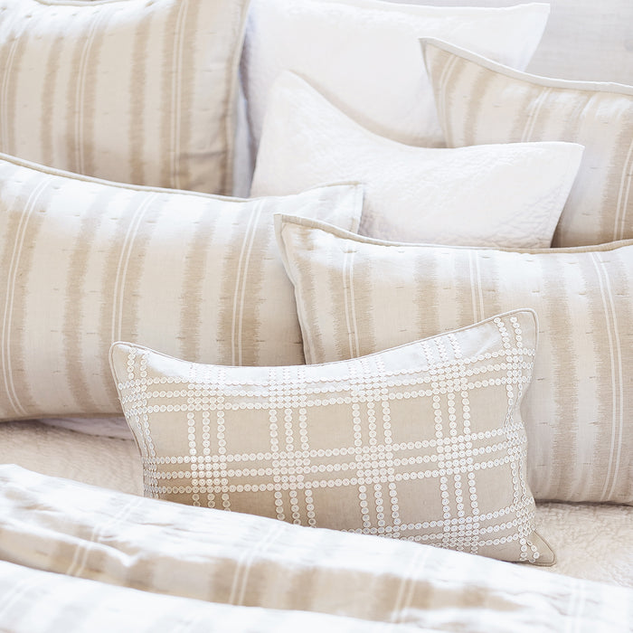 A Farren Quilt displayed on a made bed.