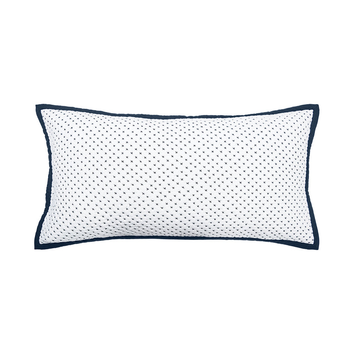 A king-sized pillow sham with a white base and Navy blue cross-stitch pattern.
