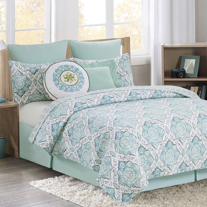 A Harlen Quilt Set displayed on a made bed.