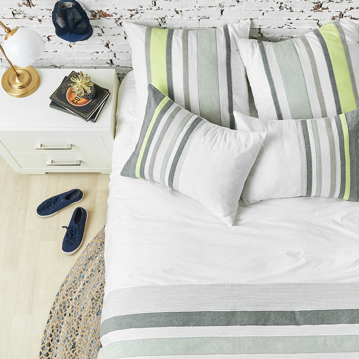 A jones duvet cover displayed on a bed.