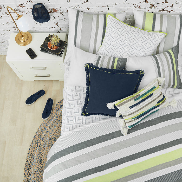 A jones duvet cover displayed on a bed.
