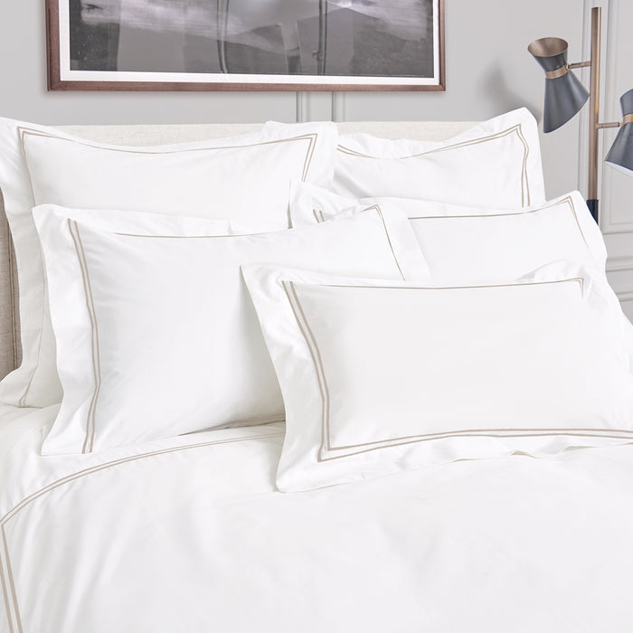 A Legacy Duvet Cover displayed on a bed.