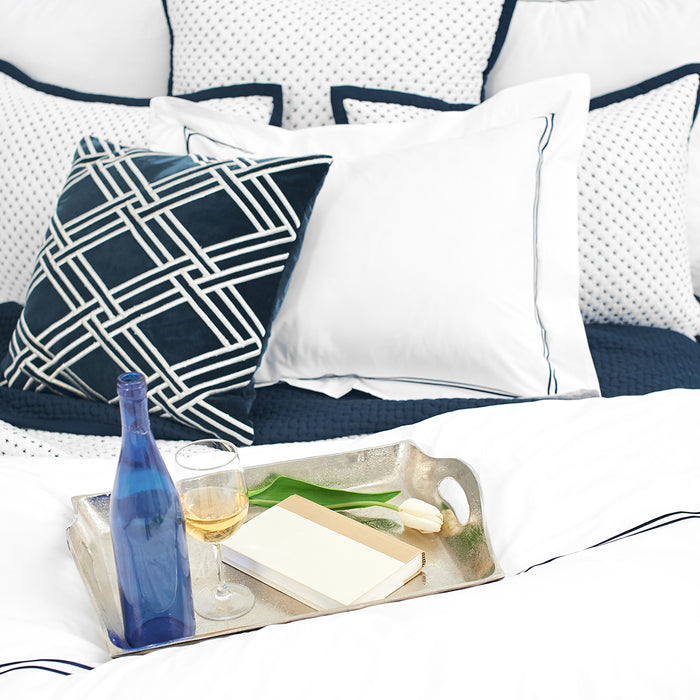 A Legacy Duvet Cover displayed on a bed.