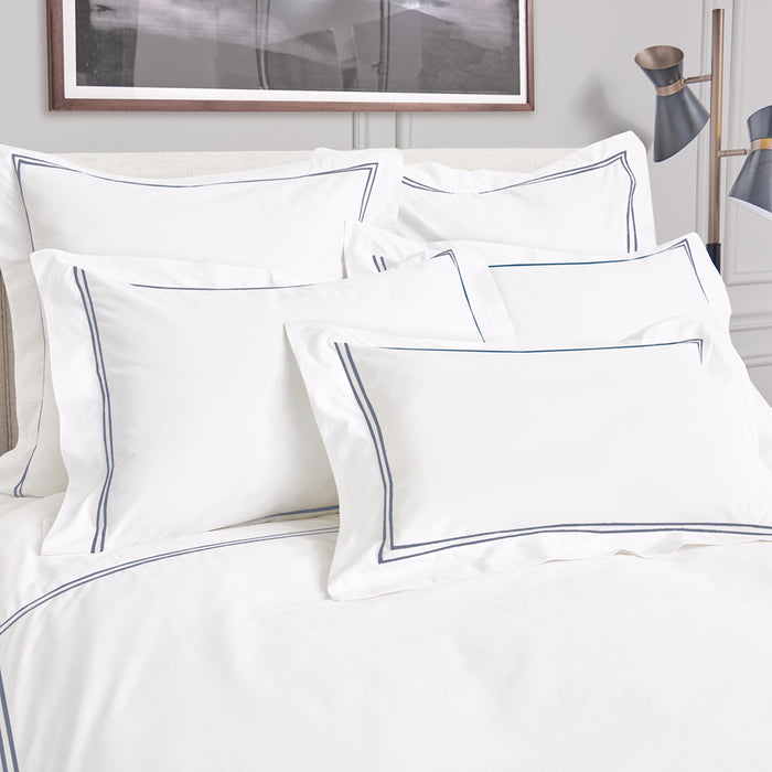 A Legacy Duvet Cover displayed on a bed.