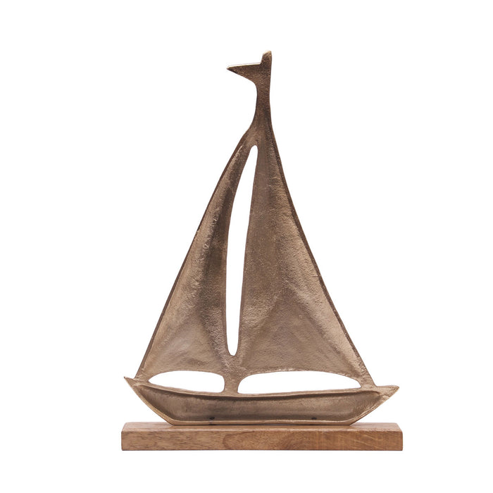 A Metal Sailboat Figure.