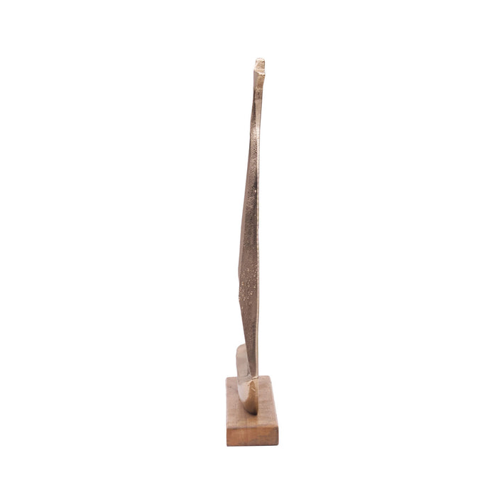 A Metal Sailboat Figure.