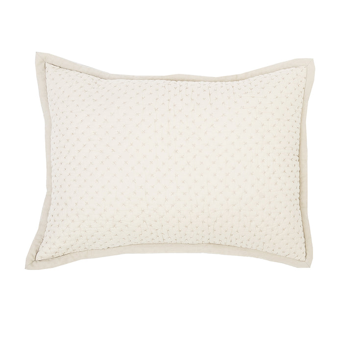 Textured standard-sized, cream colored, cotton pillow sham with piped edges.