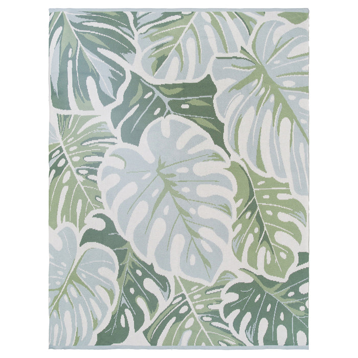 A Monstera Knit Indoor Outdoor Throw.