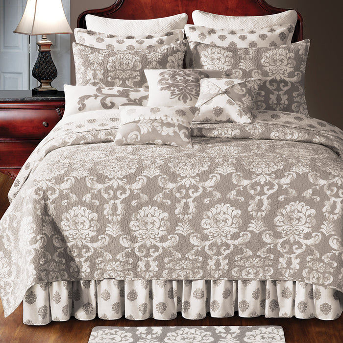 A Providence Quilt displayed on a made bed.