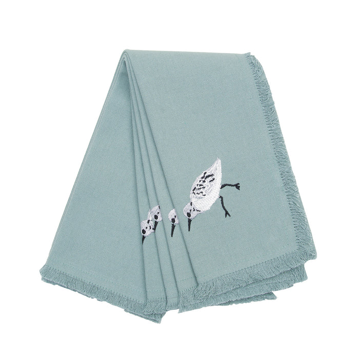 Sandpiper Sprint Table Linens table linens displayed as a coordinated tabletop setting.