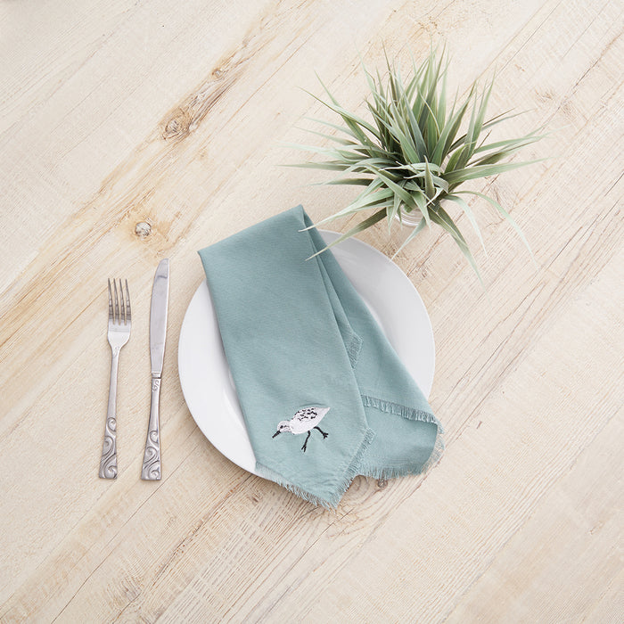 Sandpiper Sprint Table Linens table linens displayed as a coordinated tabletop setting.
