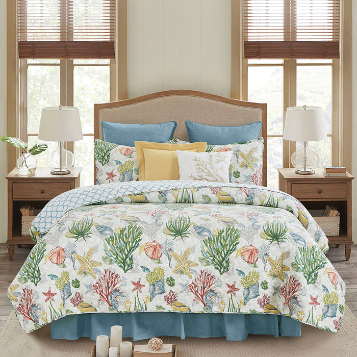 A Shellwood Sound Quilt Set displayed on a made bed.