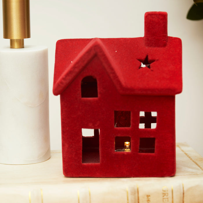 A Small Flocked Red House LED Figurine.