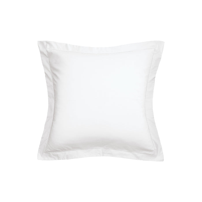A Euro pillow covered in a crisp white cotton sham with hemstitching.