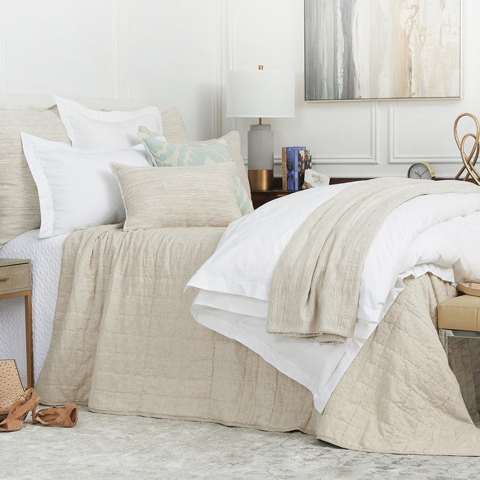 A Whitaker Duvet Cover displayed on a bed.