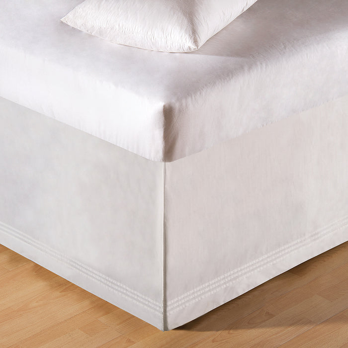 A White Tailored Bed Skirt.